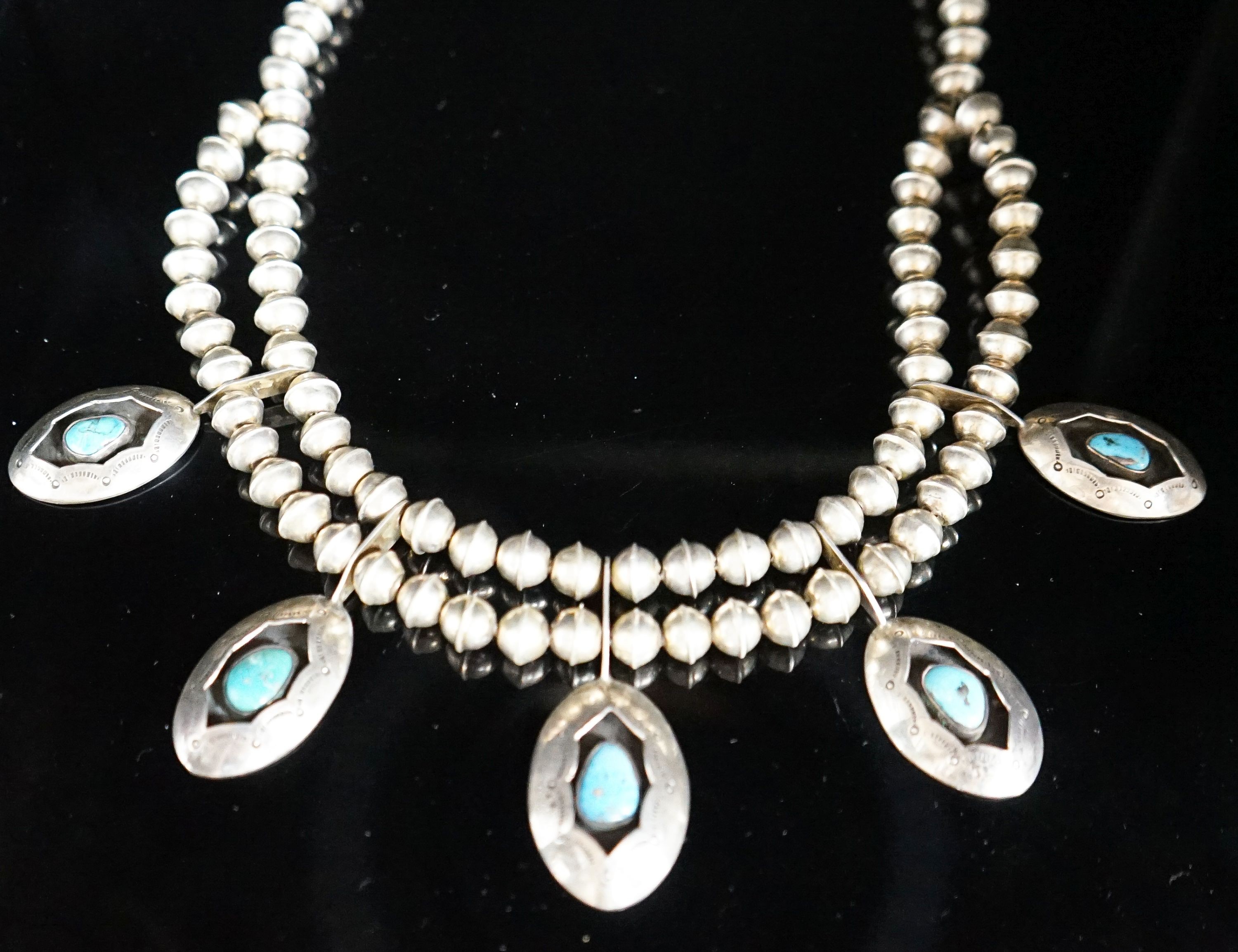 A 20th century South American? white metal and turquoise set drop necklace, approx. 44cm, gross weight 52 grams.